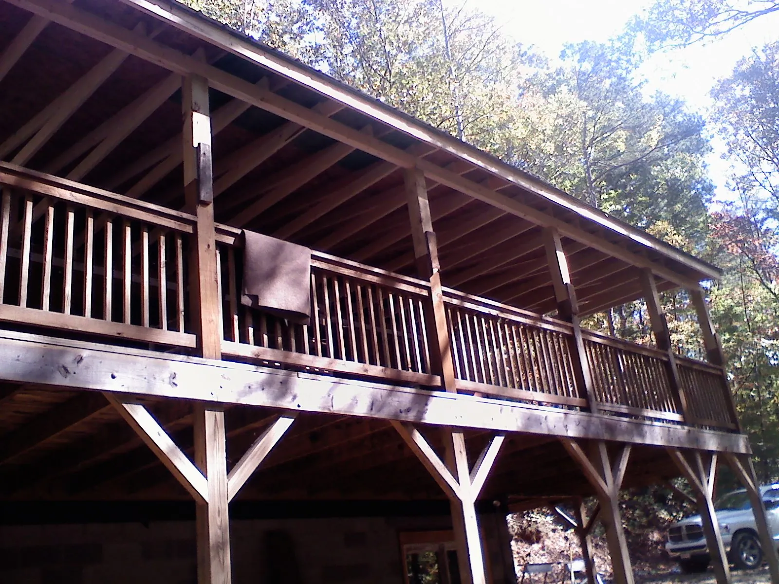 Timber framing under a new elevated porch and deck — Roof Leak Repair in Kyle by Roofing Brothers